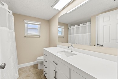 This beautifully updated Gulf Harbors waterfront home delivers on Gulf Harbors Golf Course in Florida - for sale on GolfHomes.com, golf home, golf lot