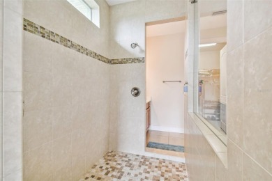 Absolutely stunning three-bedroom, two-bath, PLUS OFFICE on Apollo Beach Golf and Sea Club in Florida - for sale on GolfHomes.com, golf home, golf lot