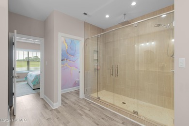 This beautiful 3-bedroom, 2.5-bath custom-built home with two on North River Club in North Carolina - for sale on GolfHomes.com, golf home, golf lot