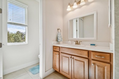 Absolutely stunning three-bedroom, two-bath, PLUS OFFICE on Apollo Beach Golf and Sea Club in Florida - for sale on GolfHomes.com, golf home, golf lot