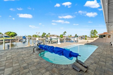 This beautifully updated Gulf Harbors waterfront home delivers on Gulf Harbors Golf Course in Florida - for sale on GolfHomes.com, golf home, golf lot