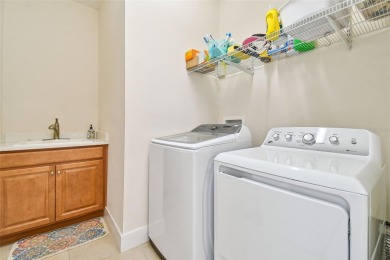 Absolutely stunning three-bedroom, two-bath, PLUS OFFICE on Apollo Beach Golf and Sea Club in Florida - for sale on GolfHomes.com, golf home, golf lot