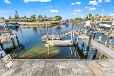 This beautifully updated Gulf Harbors waterfront home delivers on Gulf Harbors Golf Course in Florida - for sale on GolfHomes.com, golf home, golf lot