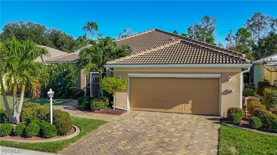 This professionally decorated home in HERONS GLEN COUNTRY CLUB on Herons Glen Golf and Country Club in Florida - for sale on GolfHomes.com, golf home, golf lot