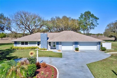 This beautifully remodeled home sits on a double lot with a on  in Florida - for sale on GolfHomes.com, golf home, golf lot