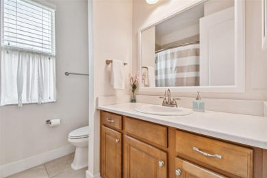 Absolutely stunning three-bedroom, two-bath, PLUS OFFICE on Apollo Beach Golf and Sea Club in Florida - for sale on GolfHomes.com, golf home, golf lot