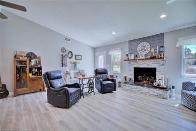This beautifully remodeled home sits on a double lot with a on  in Florida - for sale on GolfHomes.com, golf home, golf lot