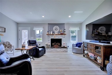 This beautifully remodeled home sits on a double lot with a on  in Florida - for sale on GolfHomes.com, golf home, golf lot