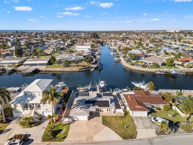 This beautifully updated Gulf Harbors waterfront home delivers on Gulf Harbors Golf Course in Florida - for sale on GolfHomes.com, golf home, golf lot