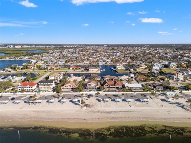 This beautifully updated Gulf Harbors waterfront home delivers on Gulf Harbors Golf Course in Florida - for sale on GolfHomes.com, golf home, golf lot