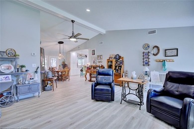 This beautifully remodeled home sits on a double lot with a on  in Florida - for sale on GolfHomes.com, golf home, golf lot