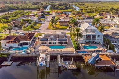 This beautifully updated Gulf Harbors waterfront home delivers on Gulf Harbors Golf Course in Florida - for sale on GolfHomes.com, golf home, golf lot
