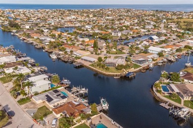 This beautifully updated Gulf Harbors waterfront home delivers on Gulf Harbors Golf Course in Florida - for sale on GolfHomes.com, golf home, golf lot