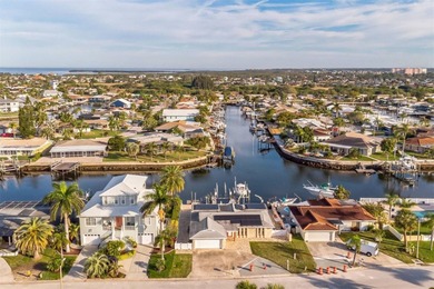 This beautifully updated Gulf Harbors waterfront home delivers on Gulf Harbors Golf Course in Florida - for sale on GolfHomes.com, golf home, golf lot