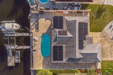 This beautifully updated Gulf Harbors waterfront home delivers on Gulf Harbors Golf Course in Florida - for sale on GolfHomes.com, golf home, golf lot