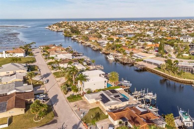 This beautifully updated Gulf Harbors waterfront home delivers on Gulf Harbors Golf Course in Florida - for sale on GolfHomes.com, golf home, golf lot