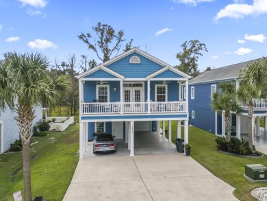 Gorgeous raised beach house near the Cherry Grove section of on Tidewater Golf Club and Plantation in South Carolina - for sale on GolfHomes.com, golf home, golf lot