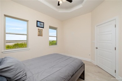 Located in SPI Golf Community, this Open-Concept Home features on South Padre Island Golf Club in Texas - for sale on GolfHomes.com, golf home, golf lot