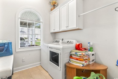Gorgeous raised beach house near the Cherry Grove section of on Tidewater Golf Club and Plantation in South Carolina - for sale on GolfHomes.com, golf home, golf lot