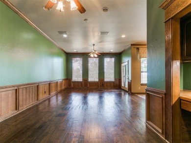 Beautiful golf course lot that backs to hole 15 on the west side on Oak Tree National Golf and Country Club in Oklahoma - for sale on GolfHomes.com, golf home, golf lot