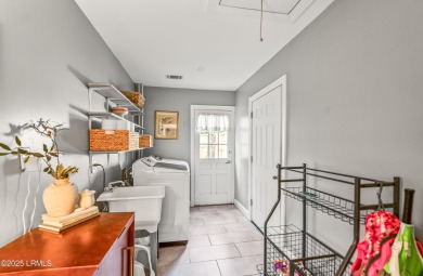 Welcome to your dream retreat! This stunning 3-bedroom on Ladys Island Country Club in South Carolina - for sale on GolfHomes.com, golf home, golf lot