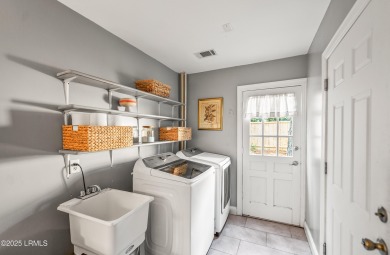 Welcome to your dream retreat! This stunning 3-bedroom on Ladys Island Country Club in South Carolina - for sale on GolfHomes.com, golf home, golf lot