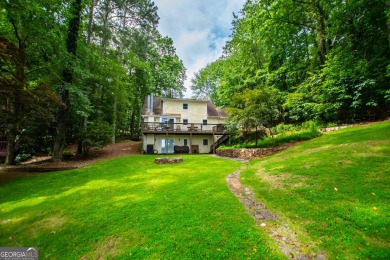 Charming Lakefront Cape Cod on the Ski Lake in Fairfield! on Fairfield Plantation Golf and Country Club in Georgia - for sale on GolfHomes.com, golf home, golf lot