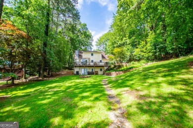 Charming Lakefront Cape Cod on the Ski Lake in Fairfield! on Fairfield Plantation Golf and Country Club in Georgia - for sale on GolfHomes.com, golf home, golf lot