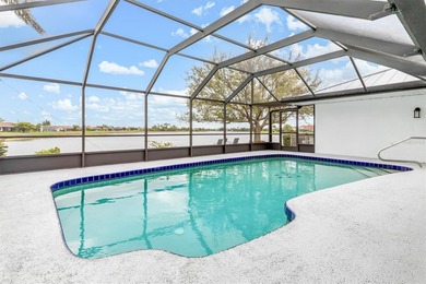 Spectacular mini estate lakefront, pool home offering 3 bedrooms on Deep Creek Golf Club in Florida - for sale on GolfHomes.com, golf home, golf lot