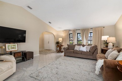 Spectacular mini estate lakefront, pool home offering 3 bedrooms on Deep Creek Golf Club in Florida - for sale on GolfHomes.com, golf home, golf lot