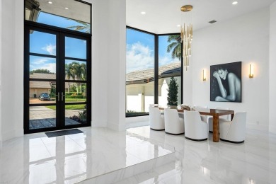 Experience luxury living in this beautifully renovated on Bocaire Country Club in Florida - for sale on GolfHomes.com, golf home, golf lot