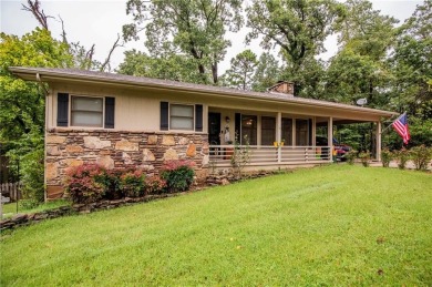 Adorable and cozy meets easy access. This quiet street is just a on Bella Vista Country Club - Kingswood in Arkansas - for sale on GolfHomes.com, golf home, golf lot