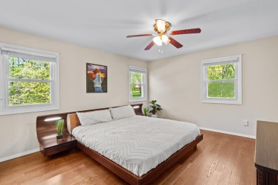 Experience the true Pocono feel in this warm and inviting on Pocono Farms Country Club in Pennsylvania - for sale on GolfHomes.com, golf home, golf lot