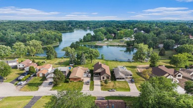 Charming LAKEFRONT RANCH WITH WALKOUT BASEMENT WITH OVER 3300 on Lake of Four Seasons Country Club in Indiana - for sale on GolfHomes.com, golf home, golf lot