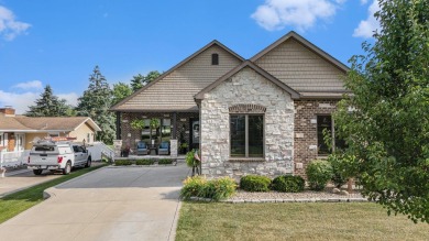 Charming LAKEFRONT RANCH WITH WALKOUT BASEMENT WITH OVER 3300 on Lake of Four Seasons Country Club in Indiana - for sale on GolfHomes.com, golf home, golf lot