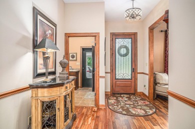 Charming LAKEFRONT RANCH WITH WALKOUT BASEMENT WITH OVER 3300 on Lake of Four Seasons Country Club in Indiana - for sale on GolfHomes.com, golf home, golf lot
