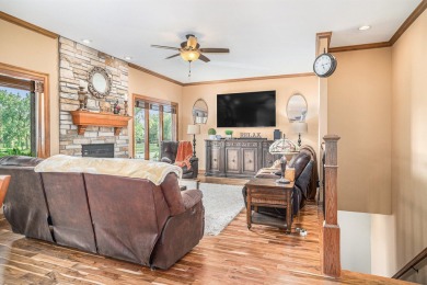 Charming LAKEFRONT RANCH WITH WALKOUT BASEMENT WITH OVER 3300 on Lake of Four Seasons Country Club in Indiana - for sale on GolfHomes.com, golf home, golf lot
