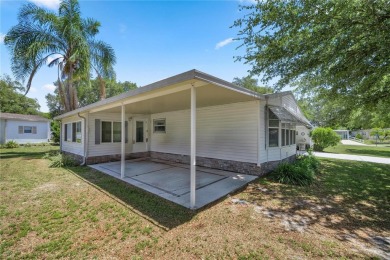 Welcome to this charming, manufactured home featuring two on Silver Lake Executive Golf Course in Florida - for sale on GolfHomes.com, golf home, golf lot