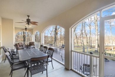 You'll find this home alongside the lush rolling greens nestled on The Club At Porto Cima in Missouri - for sale on GolfHomes.com, golf home, golf lot