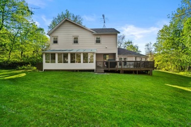 Experience the true Pocono feel in this warm and inviting on Pocono Farms Country Club in Pennsylvania - for sale on GolfHomes.com, golf home, golf lot