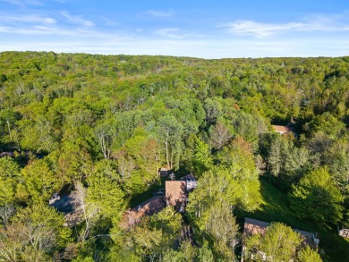 Experience the true Pocono feel in this warm and inviting on Pocono Farms Country Club in Pennsylvania - for sale on GolfHomes.com, golf home, golf lot