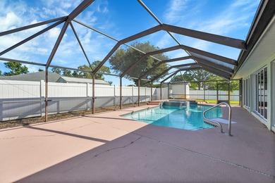 2023 ROOF!! Spacious, Well-Maintained Holiday Pines Pool/Spa on Island Pines Golf Club in Florida - for sale on GolfHomes.com, golf home, golf lot