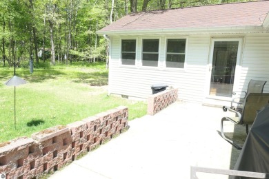 Welcome to this cozy 3-bedroom 2-bath home in Canadian Lakes on Canadian Lakes Country Club-The Royal Course in Michigan - for sale on GolfHomes.com, golf home, golf lot