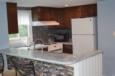 This is a beautiful 2-bedroom, 2-bath condo on the upper level on The Eagle Pointe Golf Resort in Indiana - for sale on GolfHomes.com, golf home, golf lot
