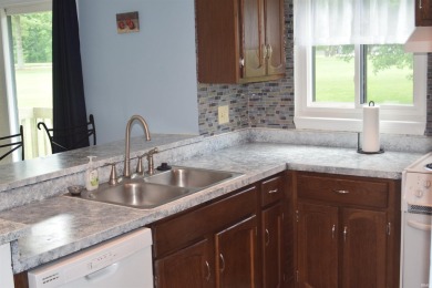 This is a beautiful 2-bedroom, 2-bath condo on the upper level on The Eagle Pointe Golf Resort in Indiana - for sale on GolfHomes.com, golf home, golf lot