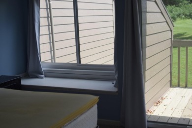 This is a beautiful 2-bedroom, 2-bath condo on the upper level on The Eagle Pointe Golf Resort in Indiana - for sale on GolfHomes.com, golf home, golf lot
