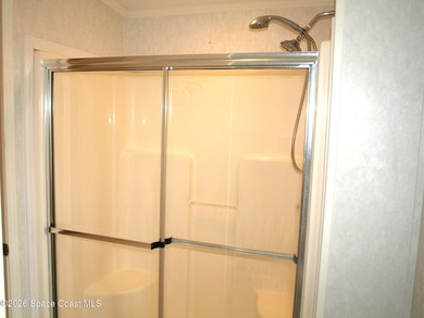 Brand New Roof To Be Installed On This 'Homes of Merit' Double on Barefoot Bay Golf Course in Florida - for sale on GolfHomes.com, golf home, golf lot