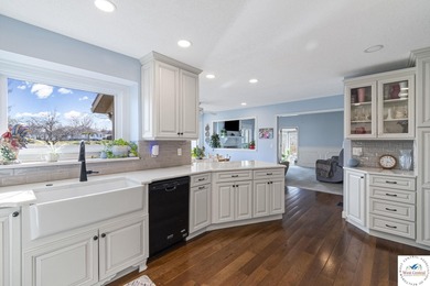 Stunning home located on the 9th hole of Meadow Lake Golf Course on Meadow Lake Golf Course in Missouri - for sale on GolfHomes.com, golf home, golf lot