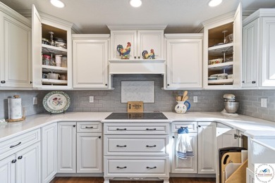 Stunning home located on the 9th hole of Meadow Lake Golf Course on Meadow Lake Golf Course in Missouri - for sale on GolfHomes.com, golf home, golf lot