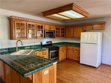 A true mountain escape in a premier Moonridge location--just a on Big Bear Mountain Ski and Golf Resort in California - for sale on GolfHomes.com, golf home, golf lot